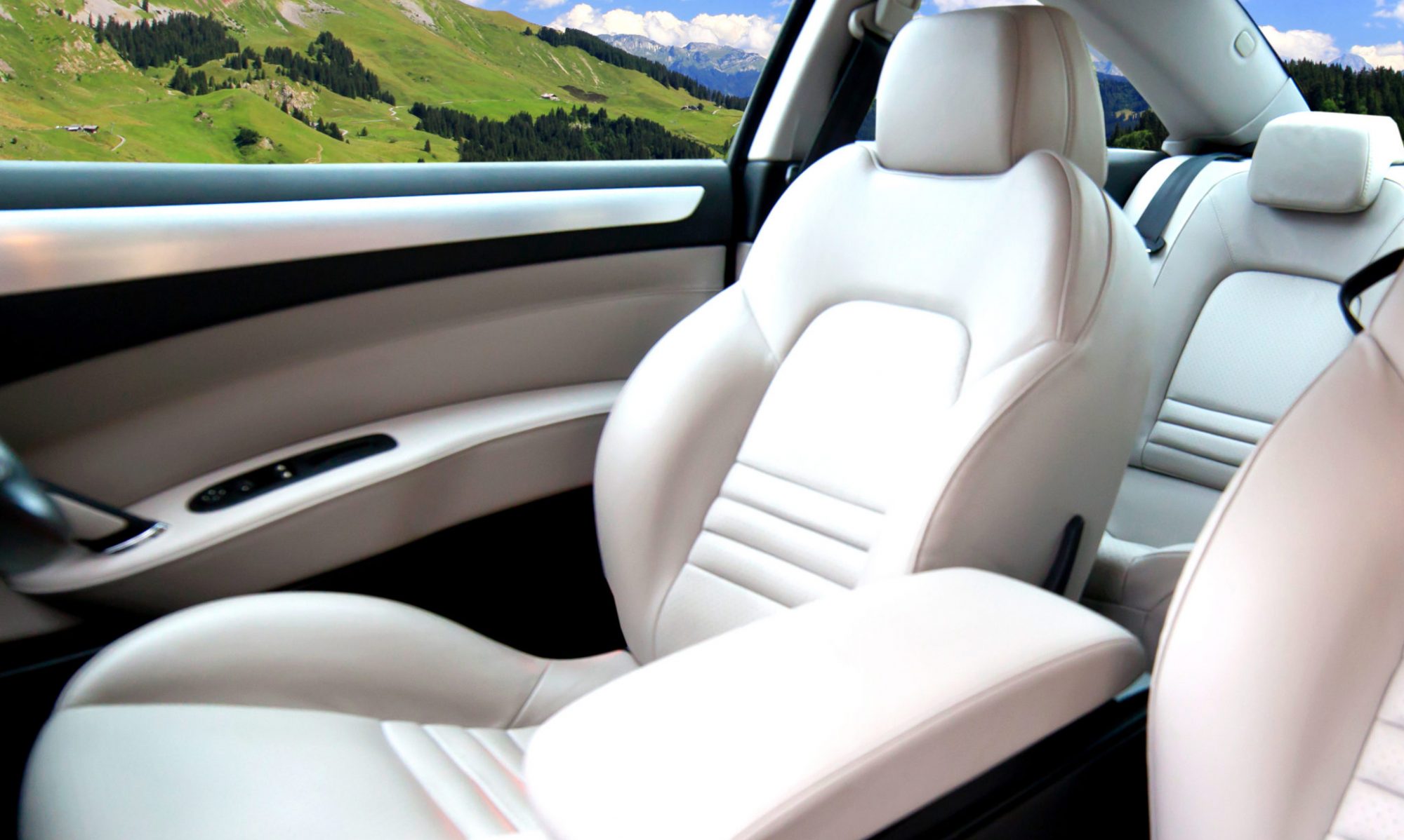 Picture of a white leather seat in a luxury car